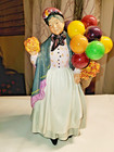 “Biddy Penny Farthing” H.N. 1843 K. Balloon Lady 8.5” by ROYAL DOULTON - Mint