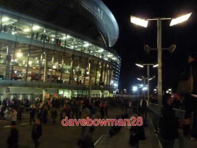 PHOTO  HIGHBURY: THE EMIRATES STADIUM BY NIGHT A NIGHTTIME VIEW OF THE NORTH END