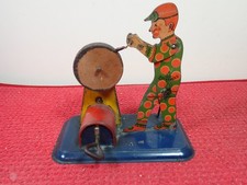 Antique SparkO Ferdinand Strauss Tin-Litho Wind Up Wheel Grinder