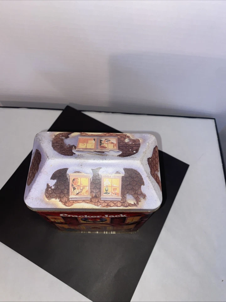 Casa de pueblo de vacaciones de Navidad Cracker Jack 1995 vintage lata coleccionable con tapa Foto 2 de 4