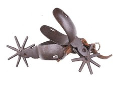 Antique engraved Mexican spurs