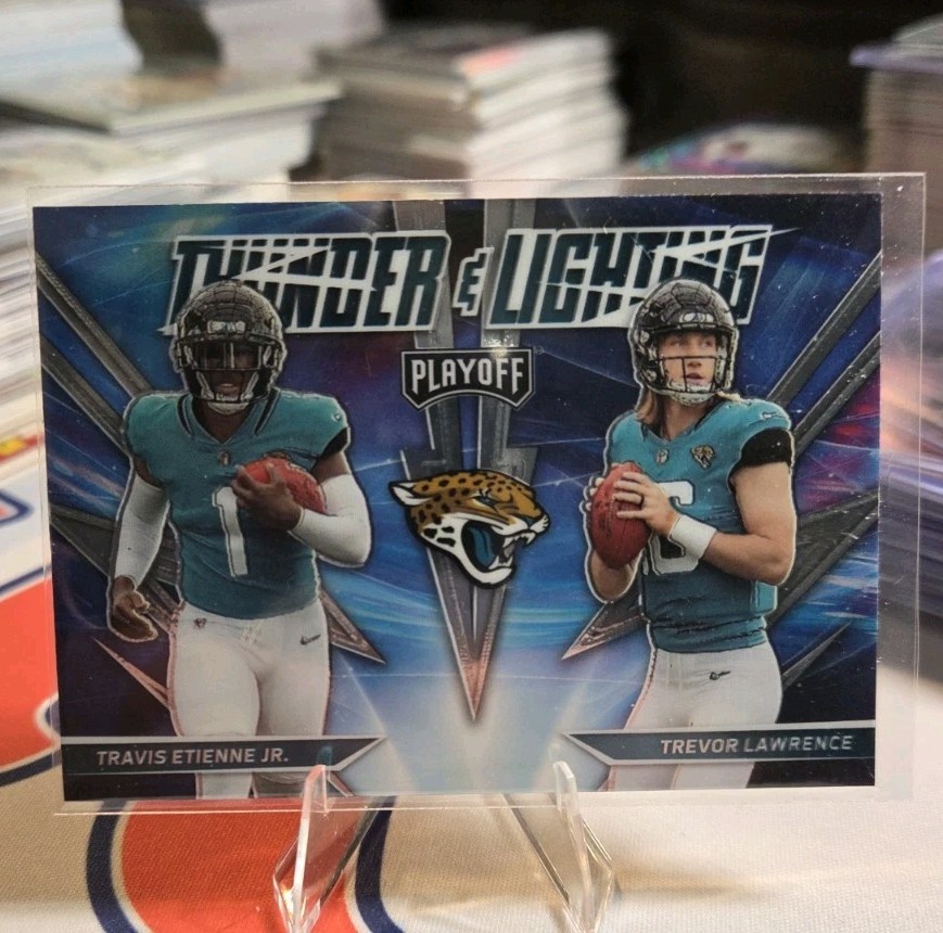 2021 Panini Playoff Thunder and Lightning Travis Etienne, Trevor Lawrence #TL-17