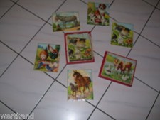Alter Kasten mit Tier-puzzel Katze Hund Hahn Esel Pferd Taube Kuh Gans Ente