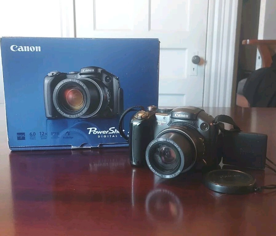 Canon PowerShot S3 IS 6MP Flip Screen Digital Bridge Camera BOXED 