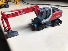 O&K MH 5.5 Powerline NZG 1:50 Modell