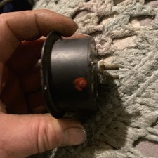 Vintage WW2 airplane voltage gauge DC by General Electric with a cracked bezel