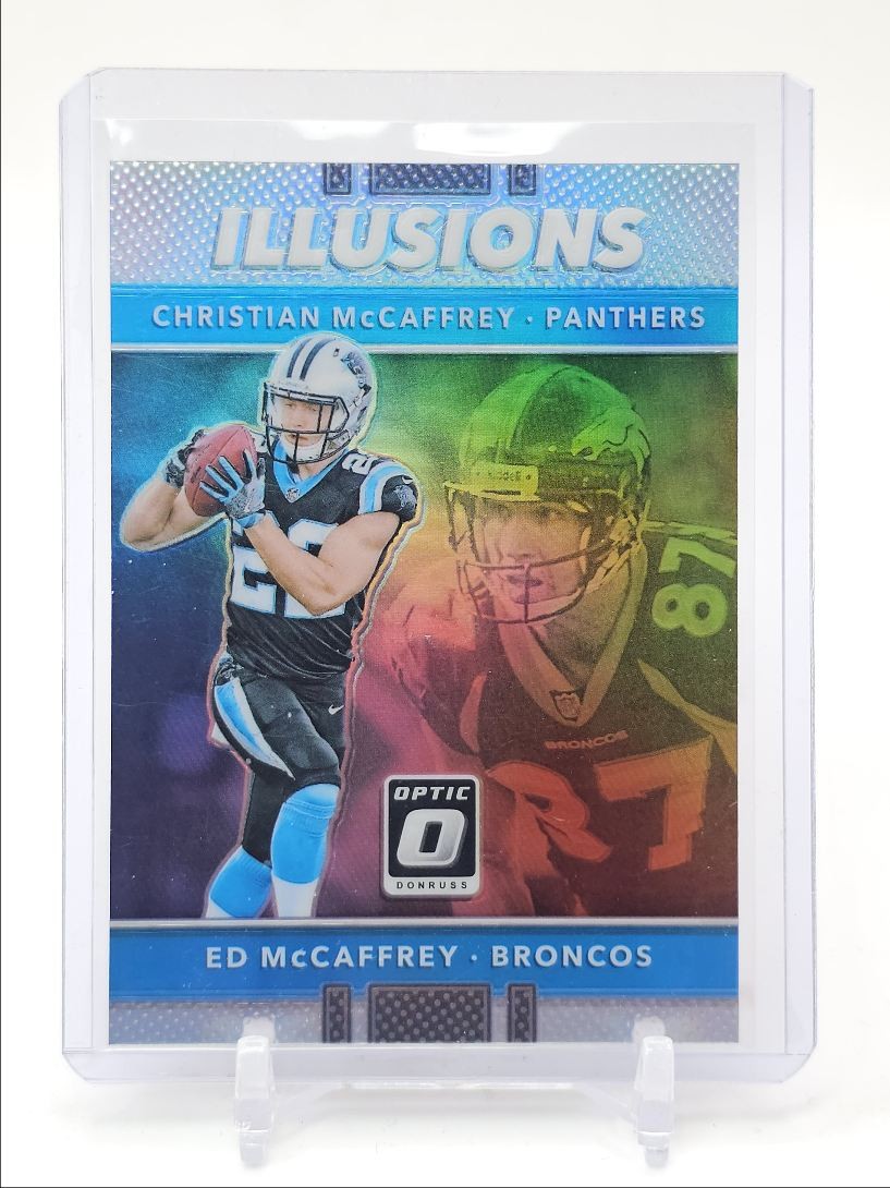 CHRISTIAN MCCAFFREY ED MCCAFFREY 2017 OPTIC ILLUSIONS ROOKIE HOLO RC Q5384
