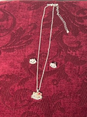 Avon Canada, Hello Kitty necklace with earrings. Necklace in its original box