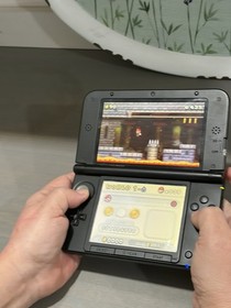 Nintendo 3DS XL Blue/Black with charger, SD card 8 games, tested works good.