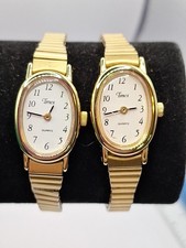 2 Timex "T" CR1216 Goldtone Ladies Watch For Parts/Repair. The TJJ Watch Works.