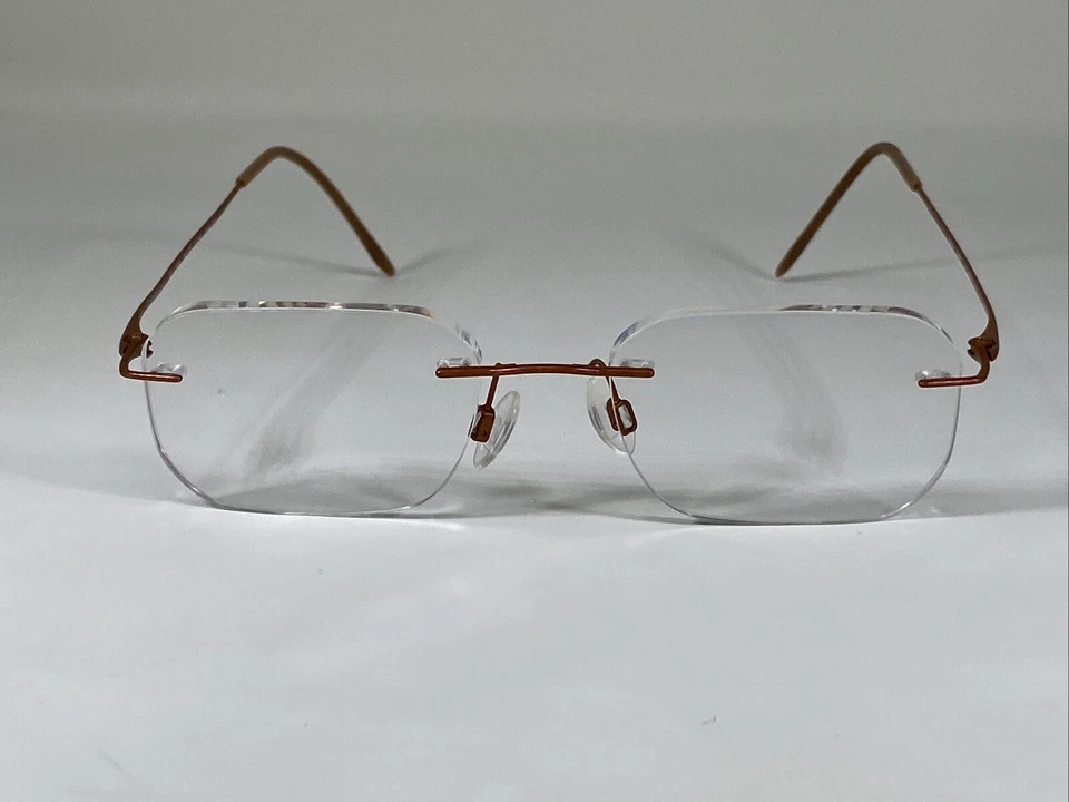 Marco de gafas CHARMANT CH8600 titanio naranja sin montura 19-140 mm  Foto 2 de 4