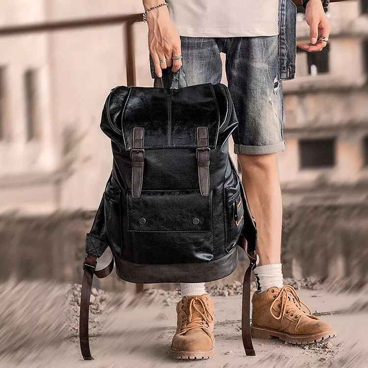 A brown faux leather and fabric laptop bag, Fine Watches