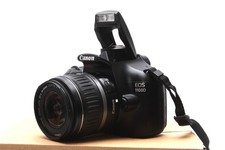 Canon EOS 1100D 12,2 MP FULL HD DSLR mit Canon EF-S 18-55mm II Objektiv + Zub