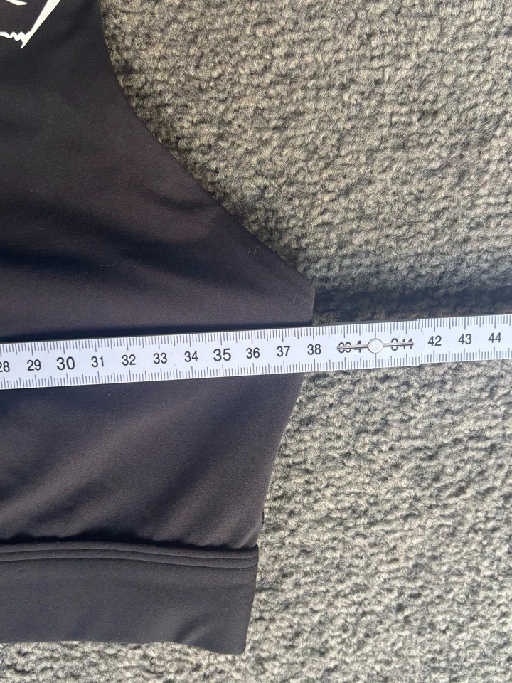 Sujetador deportivo Gymshark para mujer talla grande negro cuello en V espalda deportiva rendimiento Foto 2 de 4