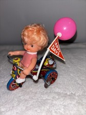 Vintage Happy Days Mechanical Tin Wind up Toy, Girl on Tricycle Pink Balloon