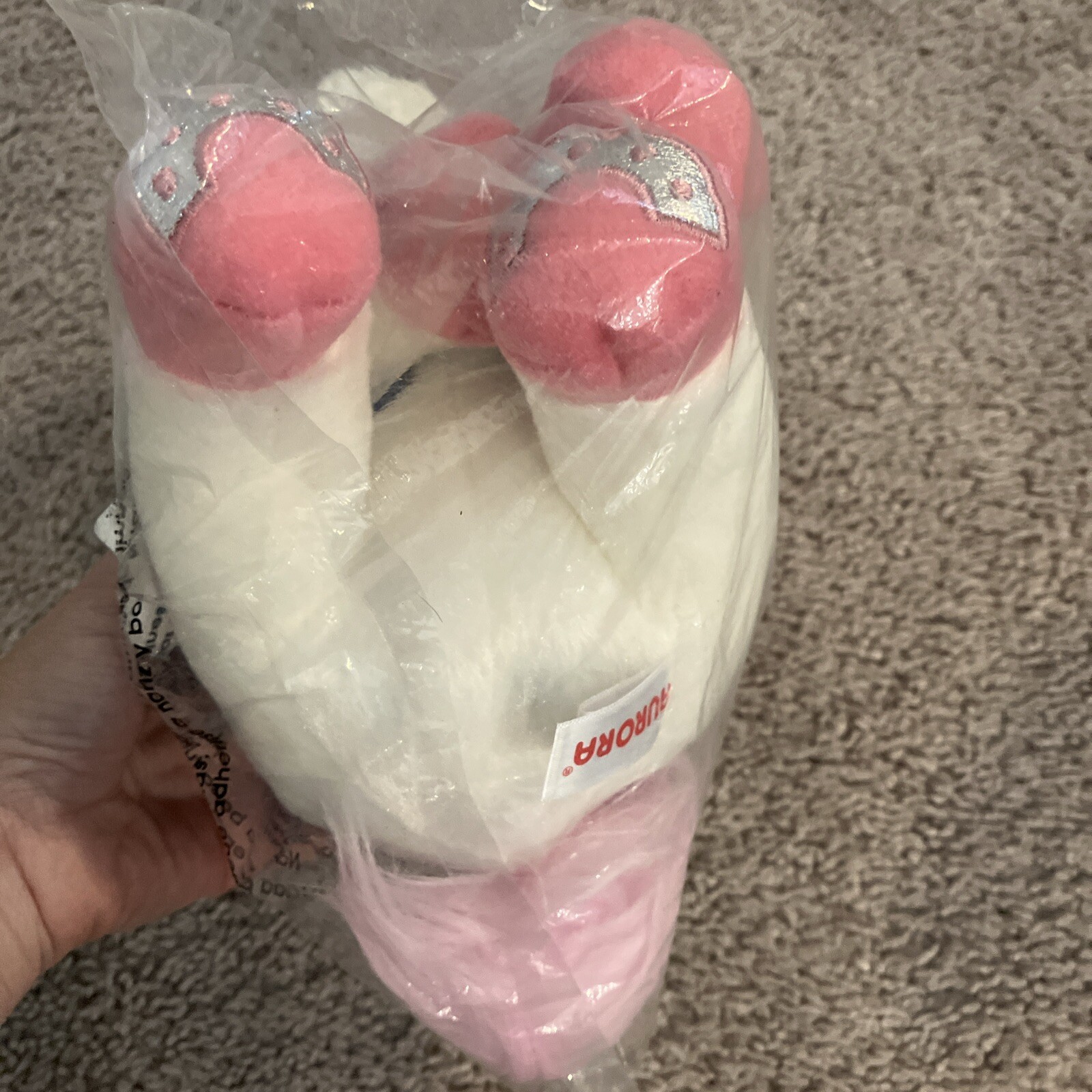 Aurora pony con cappello rosa e peluche bandana