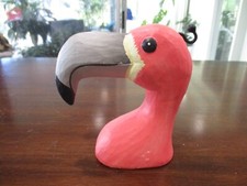 wooden pink flamingo store display Sally's Optical Secrets eyeglass holder