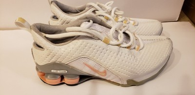 peach color nike shoes