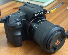 Sony Alpha A200 DSLR camera + 18-70mm f/3.5-5.6 zoom lens + bag + charger