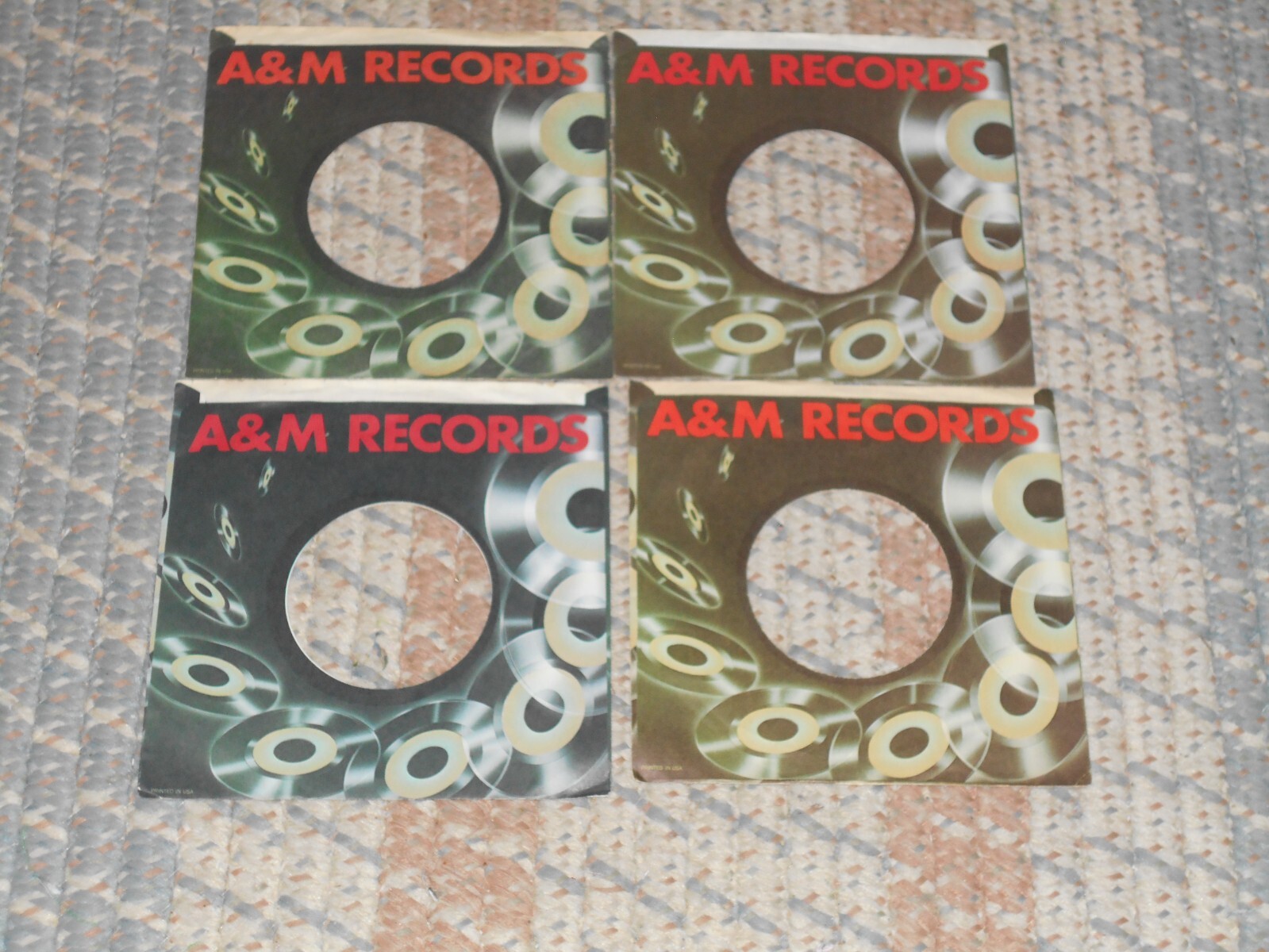 45 COMPANY  SLEEVE'S. LOT OF  FOUR A&M, SHOWING 45'S.