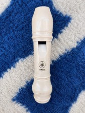 A plastic toy recorder flute that produces a clear, high-pitched sound, lightwei