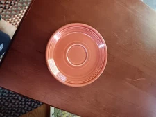 fiesta ware ?apricot saucer.  286
