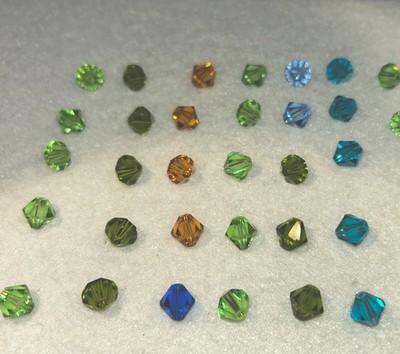 50-neue-facettierte -Swarovski-Kristalle-bunter Mix-ca 8mm-gepflegt- 