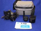 Minolta X-570 35mm Camera with 50mm Len & 2X Converter with Case & Strap — photo 1