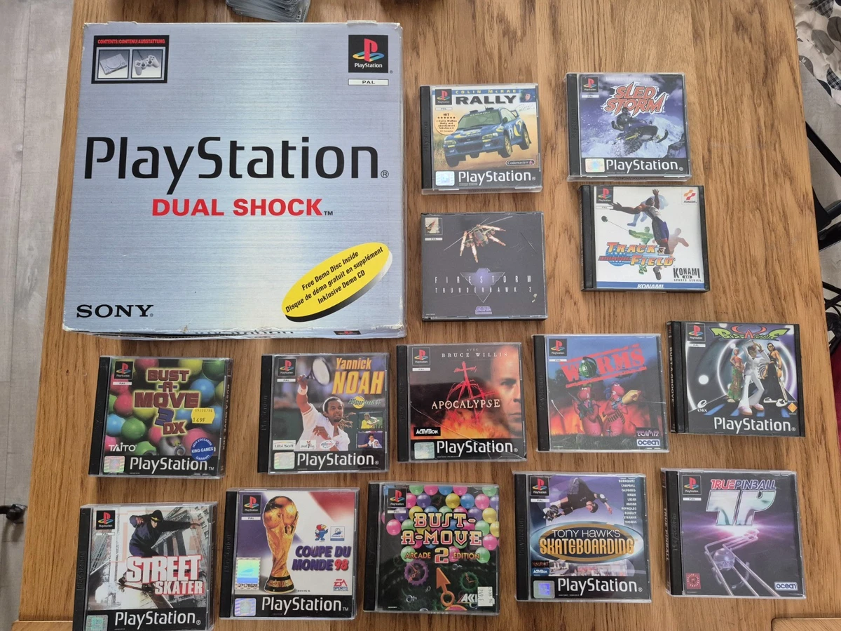 Sony Playstation 1, PS1, Fat, gris, 2 manettes + Colin Mcrae Rally + NASCAR 98