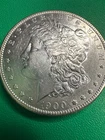 1900-O MORGAN SILVER DOLLAR IN BU CONDITION. M32