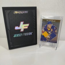 2023 JERSEY FUSION BRETT HULL GAME USED 2009 BLUES JERSEY Retirement Patch /25