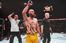 Foto autógrafa de UFC 1 firmada a mano por Guram Kutateladze 12x8