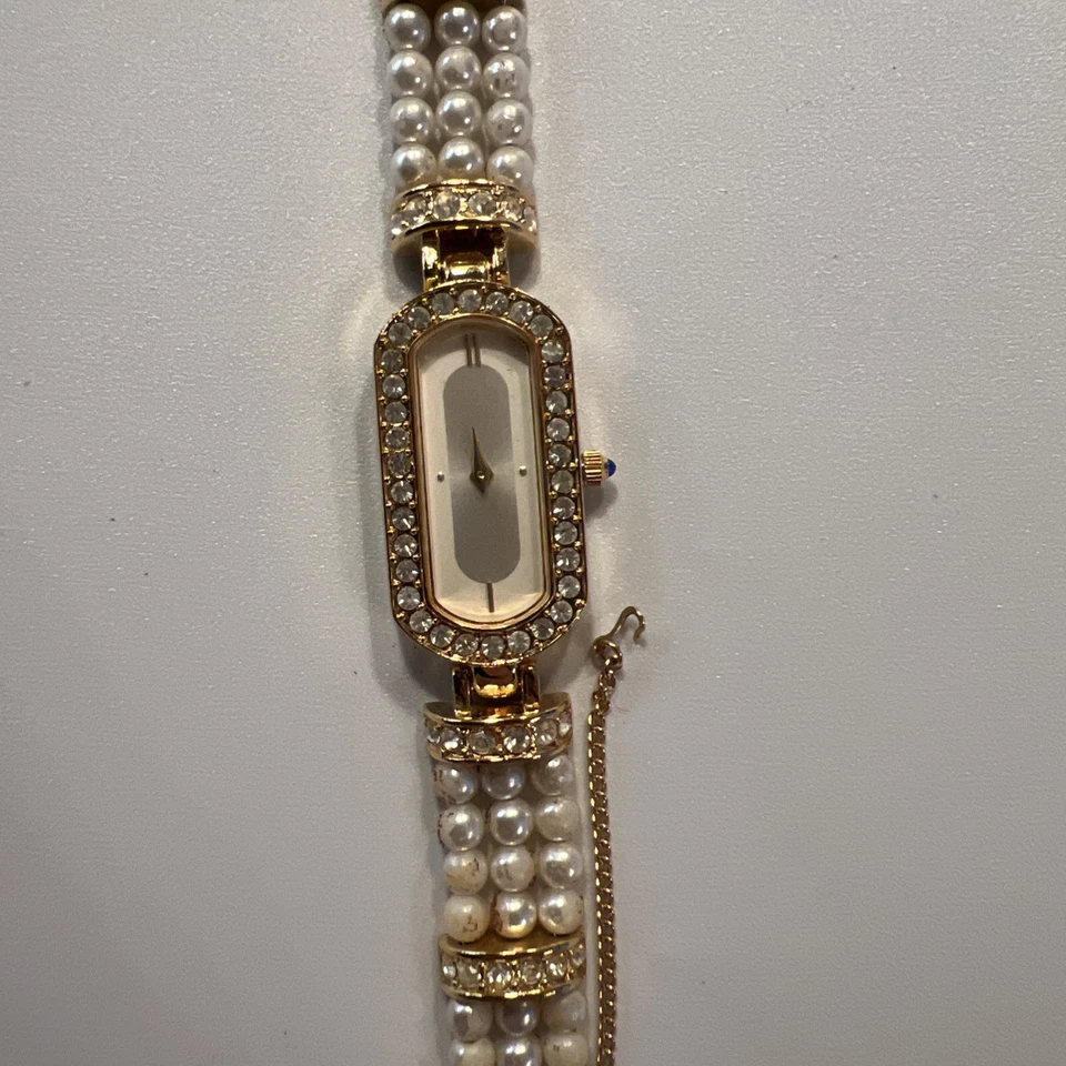 Reloj Pulsera Vintage Elizabeth Taylor Estrella de Noche Perla Dorada en Caja Original Foto 4 de 4