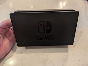 Nintendo Switch Console with Neon Red and Neon Blue Joy-Con, Dock, and cables