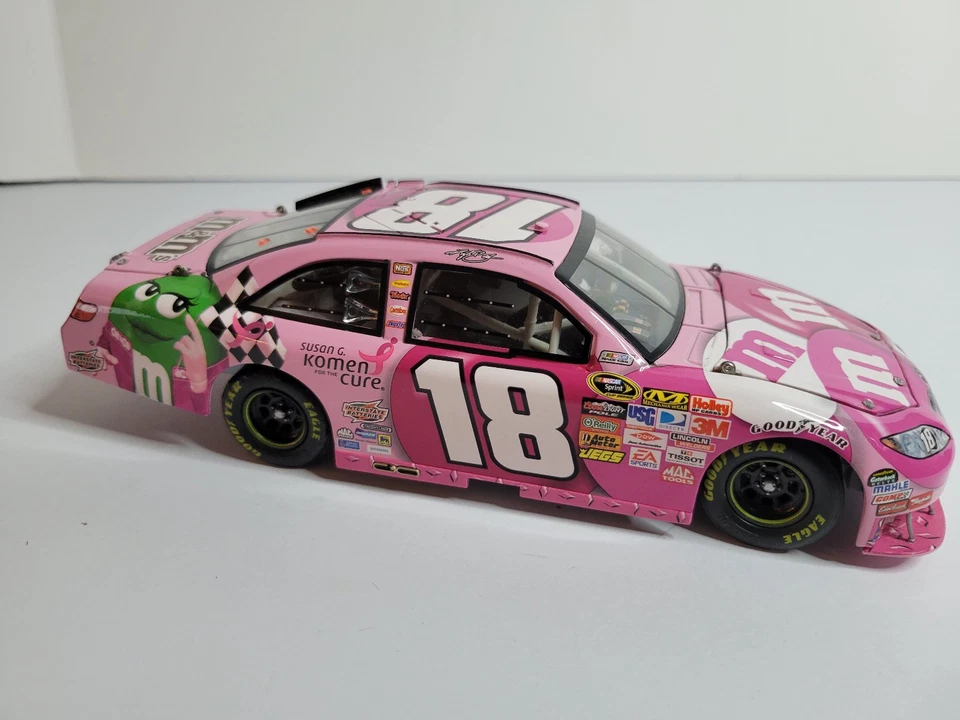 Kyle Busch 1:24 NASCAR Diecast/#18 Pink M&M’s Susan G Komen 2009 MISSING SPOILER - Image 2 of 4