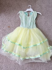 This Is A Beautiful Sunset Colored Dance Wear Dress That Provides Comfort  