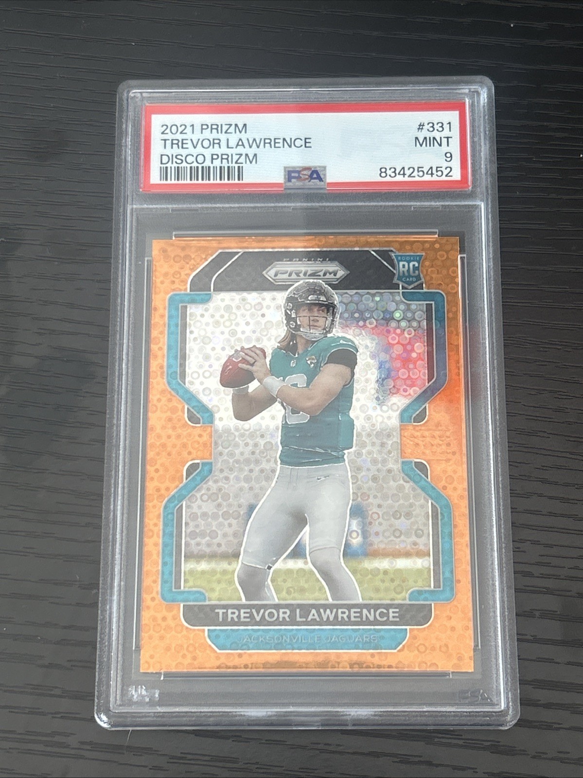 2021 Panini Prizm Rookie Trevor Lawrence #331 Orange Disco Prizm (RC) PSA 9