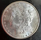 1884-CC MORGAN SILVER DOLLAR - UNCIRCULATED IN GSA HOLDER COA & BOX