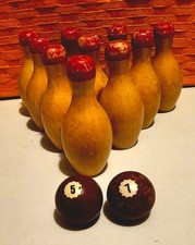 VINTAGE MINIATURE WOODEN BOWLING SET 10 WOOD PINS AND 2 BOWLING BALL S