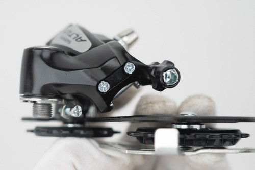BICICLETA DE MONTAÑA DESVIADOR MECÁNICO TRASERO SHIMANO ALTUS RD-M310-SGS 8 VELOCIDADES NEGRA NUEVA DE STOCK - Imagen 7 de 9