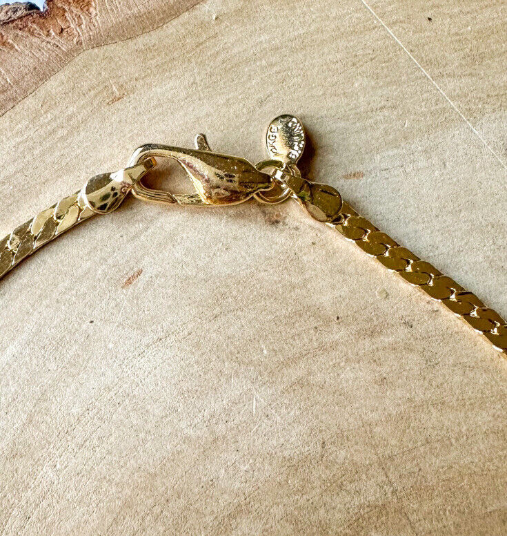 B.C. Lind bracelet 14 Kge yellow gold & double row of prong set rhinestones