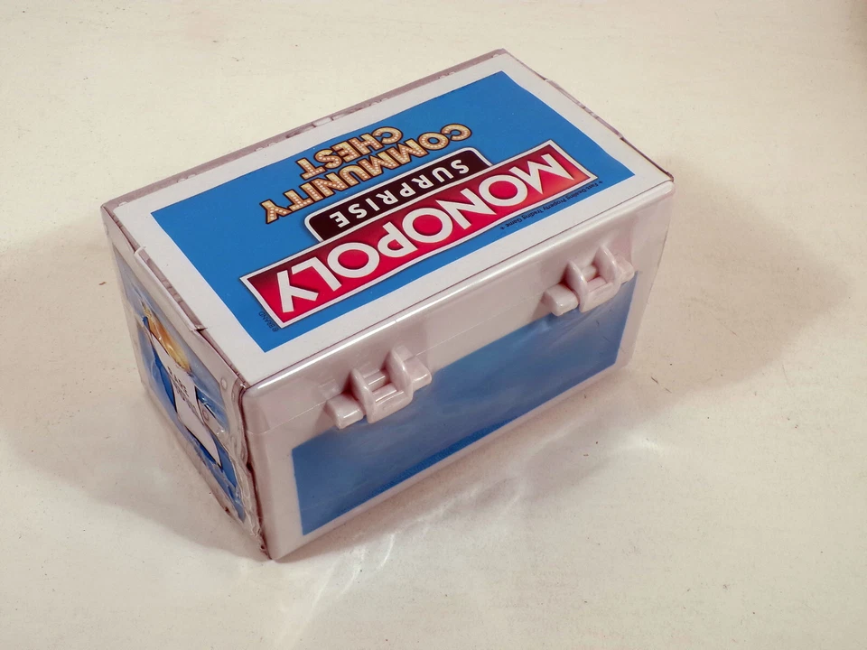 Monopoly SORPRESA Community Chest Azul con 10 Sorpresas - 25 fichas para coleccionar Foto 3 de 3