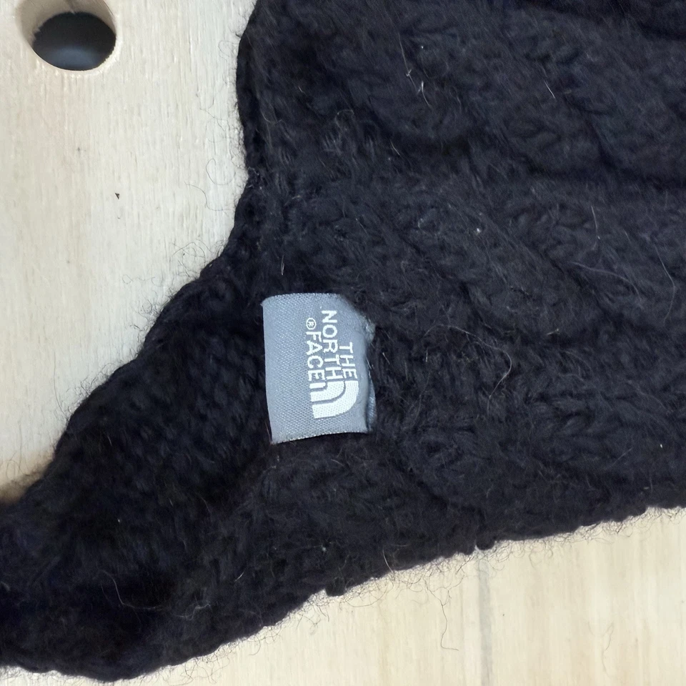 Sombrero trampero The North Face tejido con cable orejeras borla gorro negro mezcla de lana Foto 4 de 4