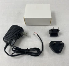 Unbranded BX18W-1201000 12V 1A AC/DC Adapter w/ International Wall Plug Adapters
