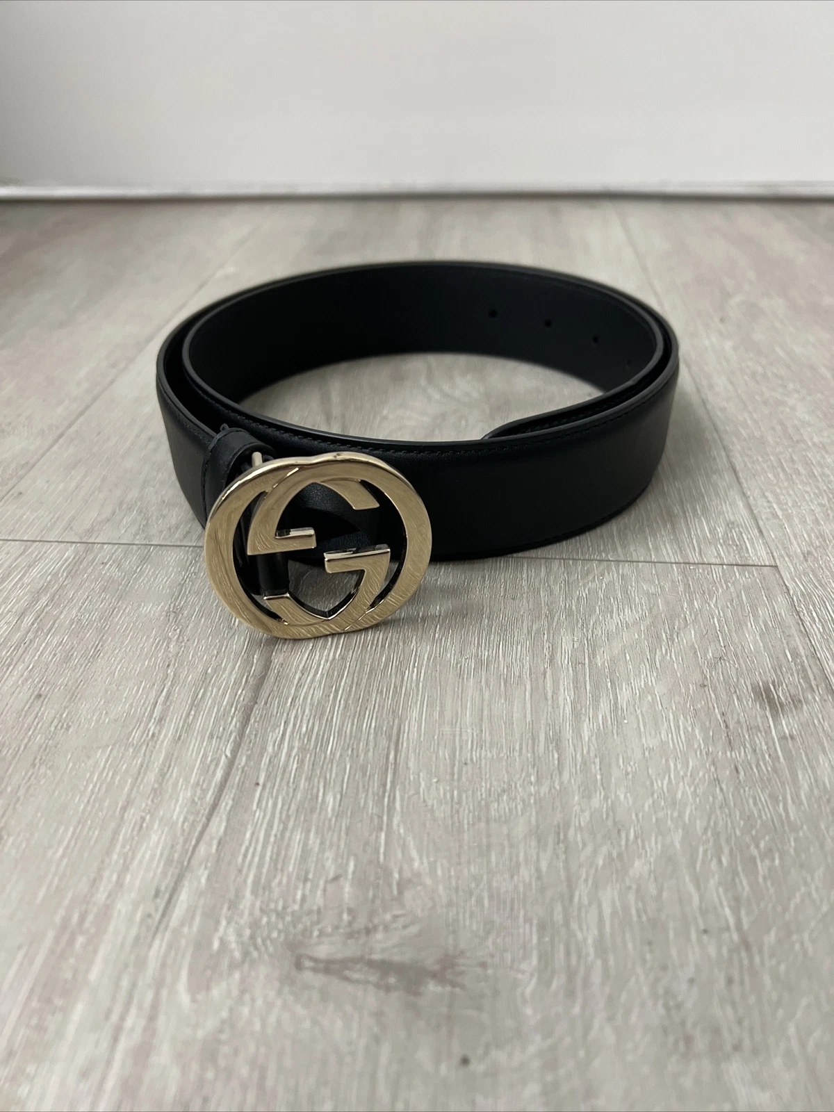 Ceinture noire Gucci avec boucle couleur argent