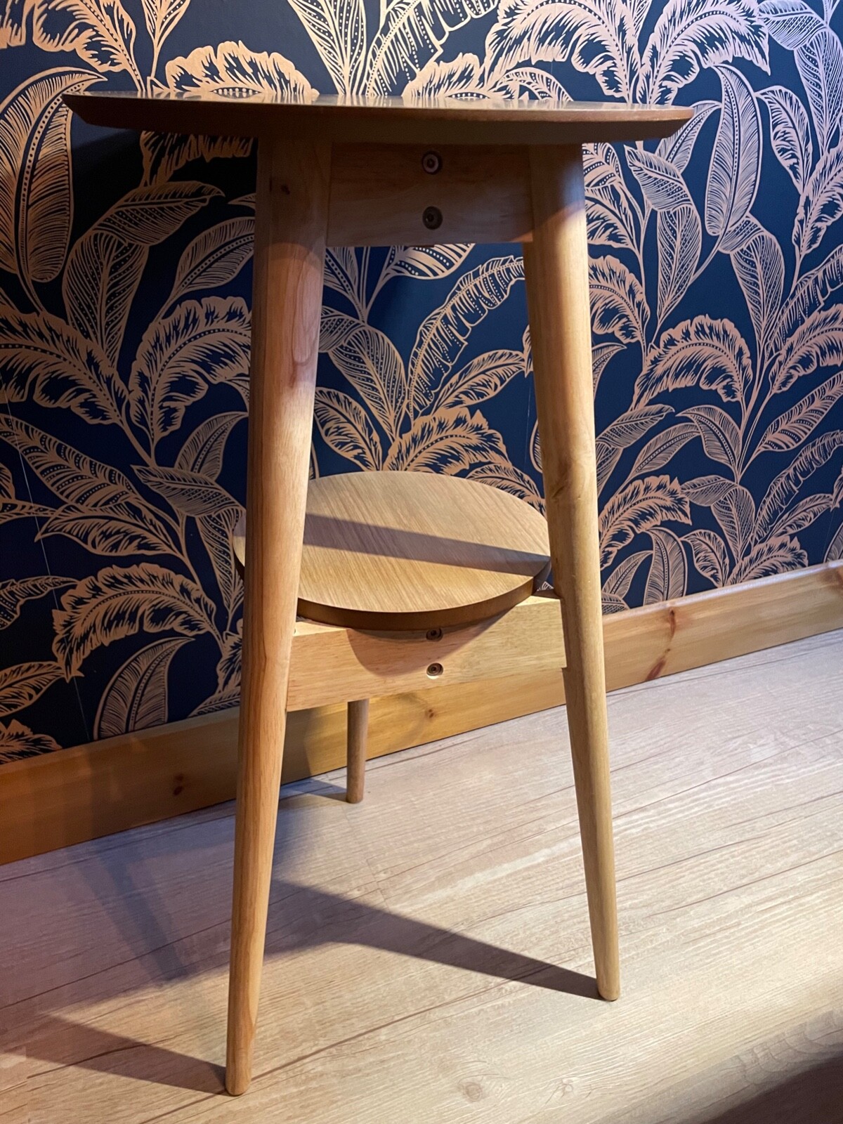 Circular wooden two tier, three legged Dias side table from Futon