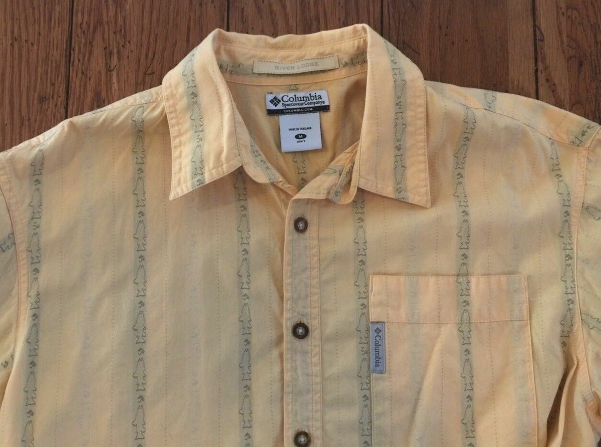 Spinnerappât. Pêche à la mouche hobby des hommes en chemise à damier