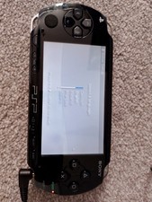 Sony PSP 1001 Black Handheld Gaming System With Games, Charger And Case