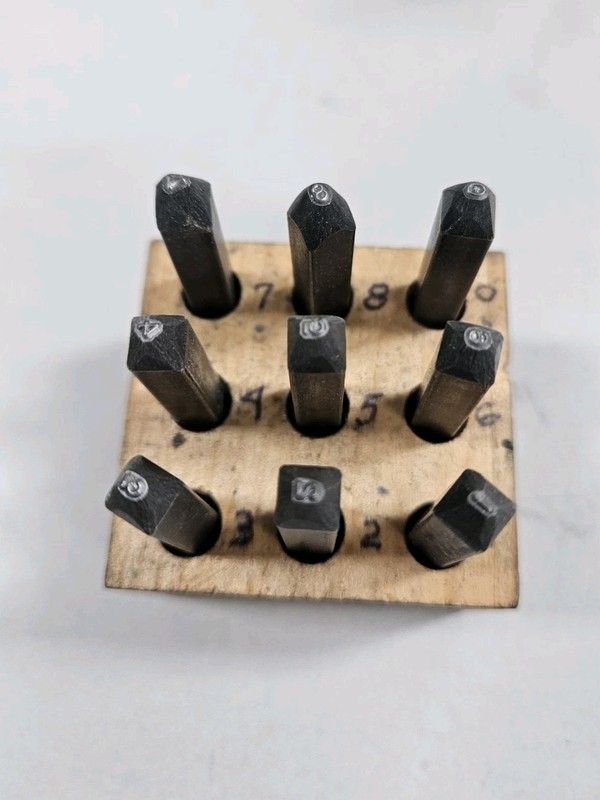 Stamp Set Numbered, steel in wooden box, 0 - 9 stamps reversed 