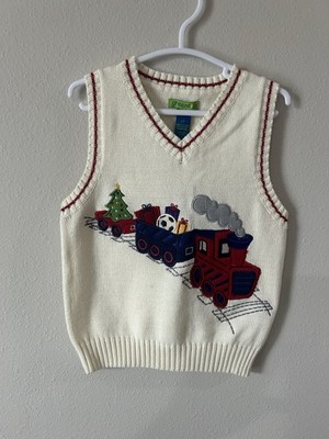 Green dog Kids  sweater vest features a festive train embroidered design